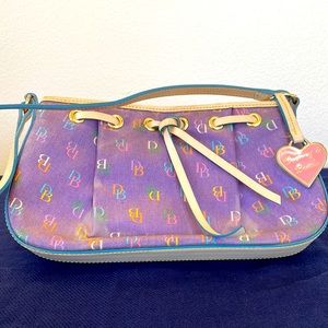 Multicolored Dooney & Bourke Tassel “It” Bag zip top shoulder bag